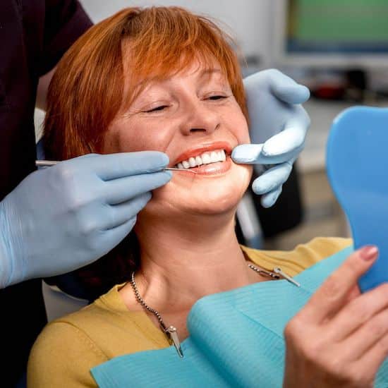 woman viewing her new smile